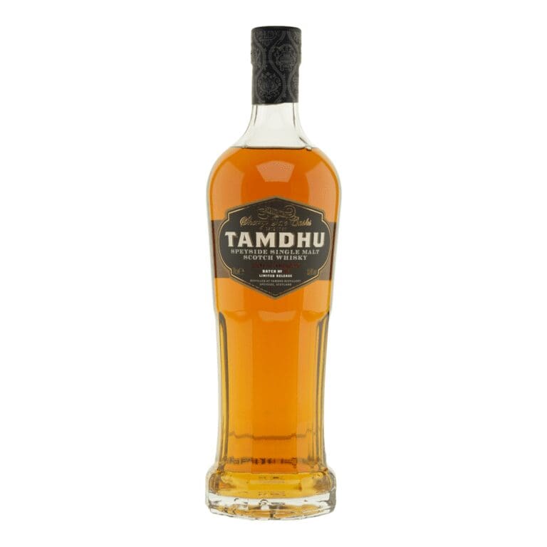 Close-up of a bottle of Tamdhu Batch Strength 008 whisky with a deep copper hue, showcasing its rich and captivating appearance